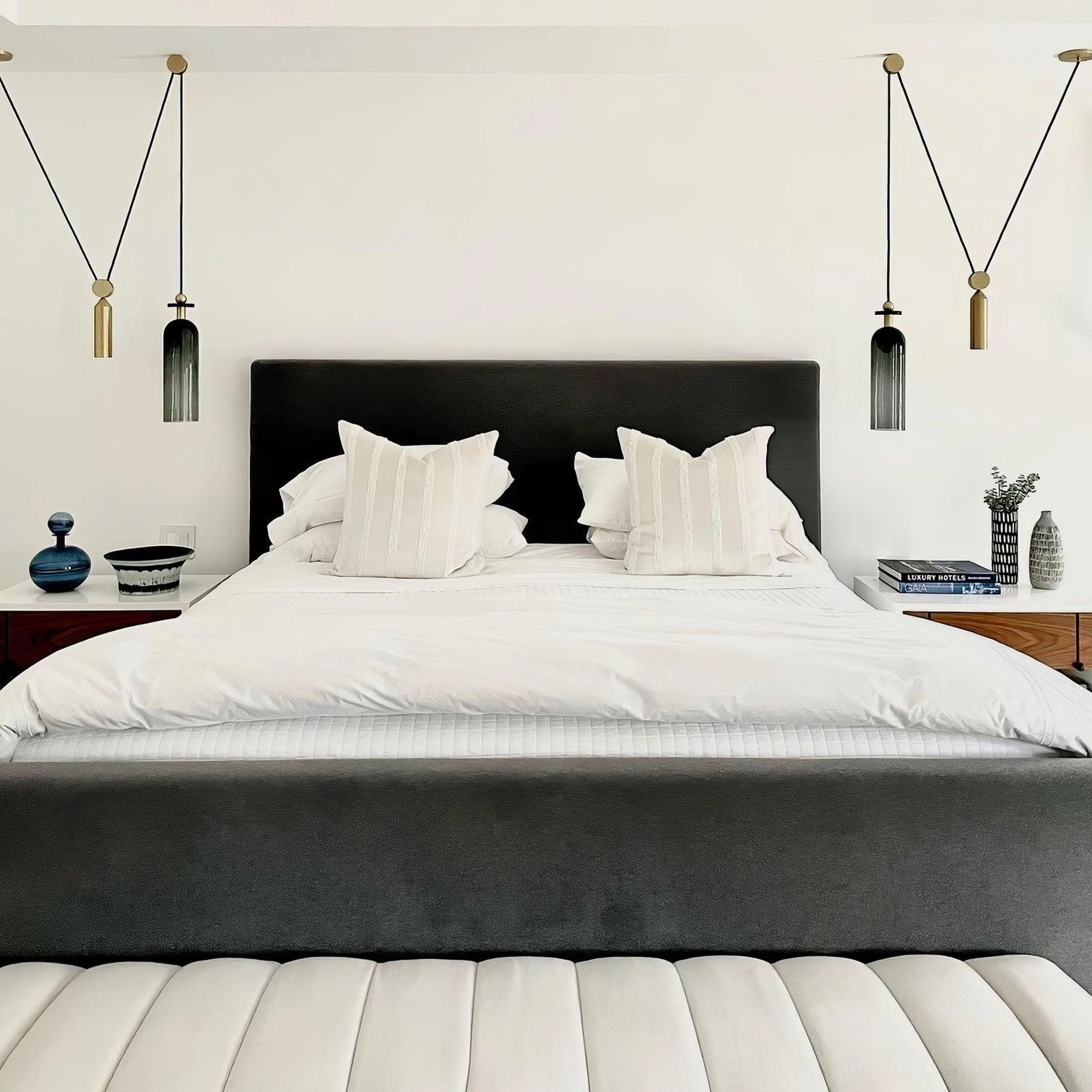 Geometric metal pendant chandelier with frosted glass shade diffusing light contemporary interior design