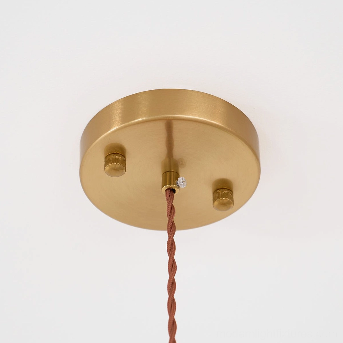 Single hand-blown frosted glass pendant light with colorful speckles, brass fixture, statement piece for contemporary dining