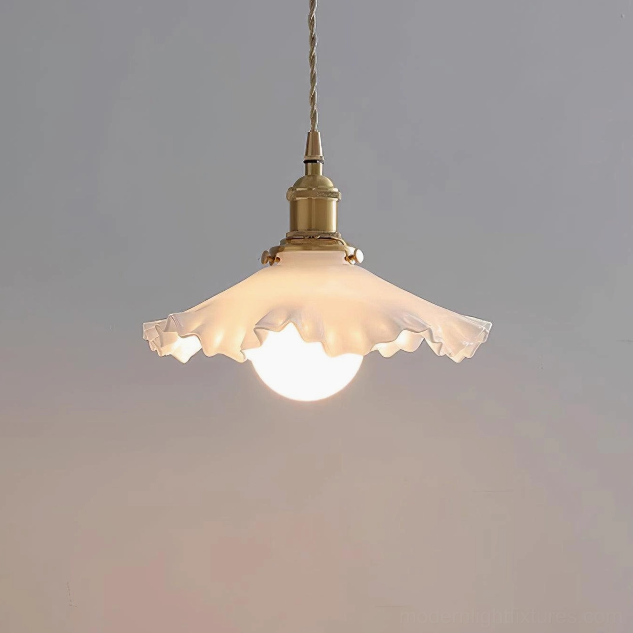 Frosted ruffled pendant light hanging fixture, close-up detail of textured glass shade quality