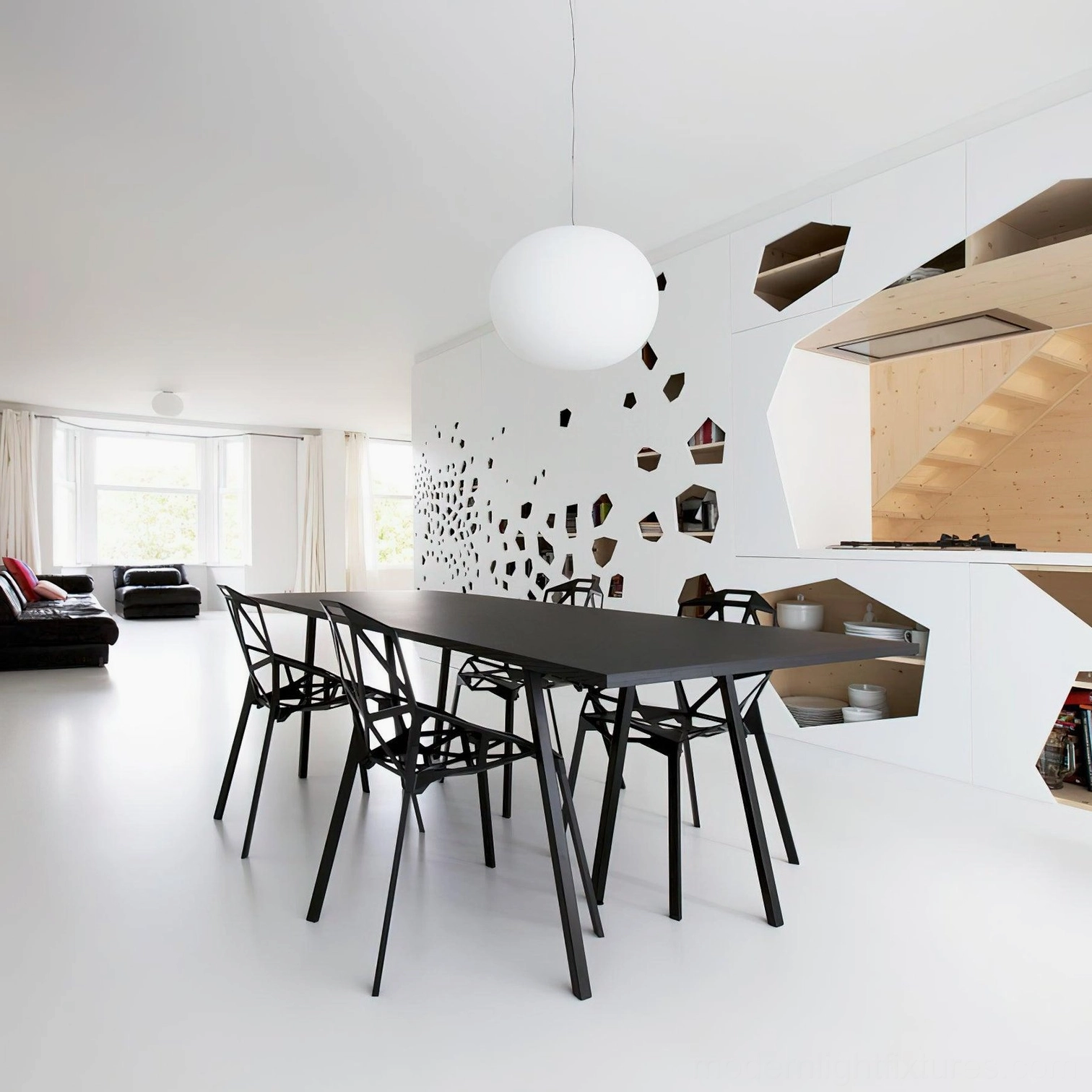 Frosted glass sphere pendant light creating ambient glow - modern pendant fixture in contemporary home setting