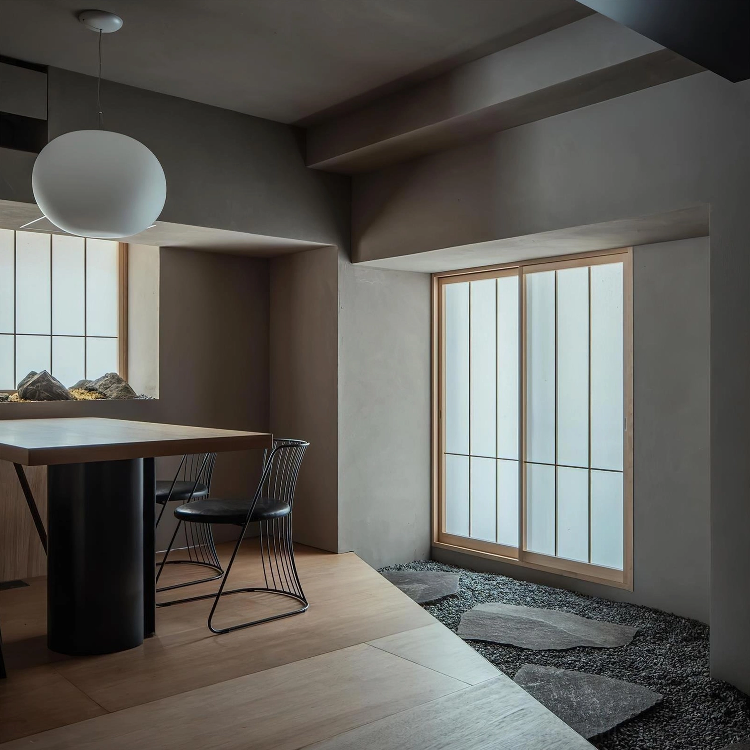 Frosted glass sphere pendant in Japandi interior - organic modern pendant light in zen-inspired minimalist space