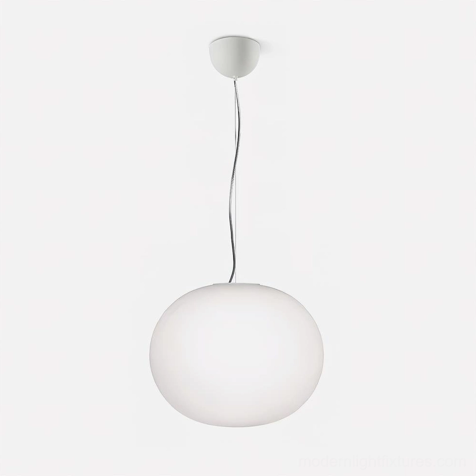 Frosted glass sphere pendant light in mid-century modern interior - stylish pendant lamp in contemporary home