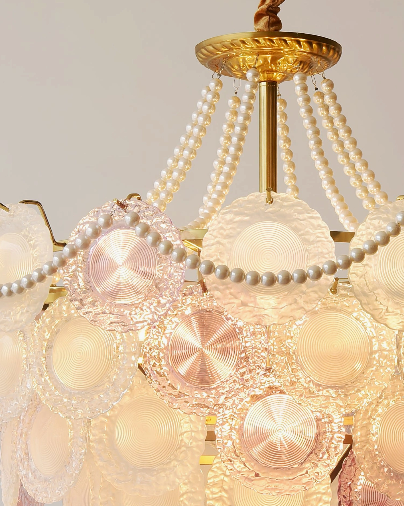 Violaire pink glass chandelier full length view from mounting hardware to lowest glass petal tier