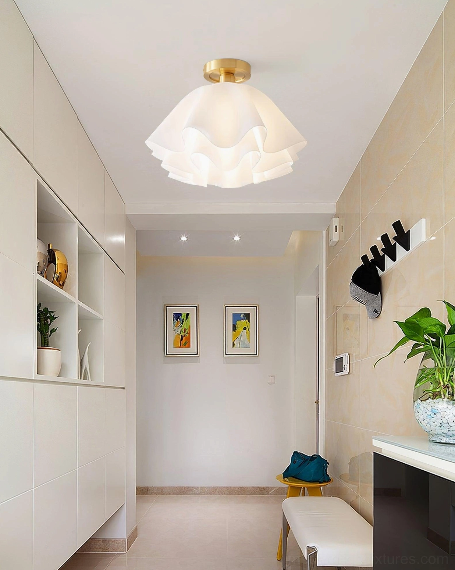 Gailon pleated ceiling fixture installed in bright white minimalist residential entryway foyer