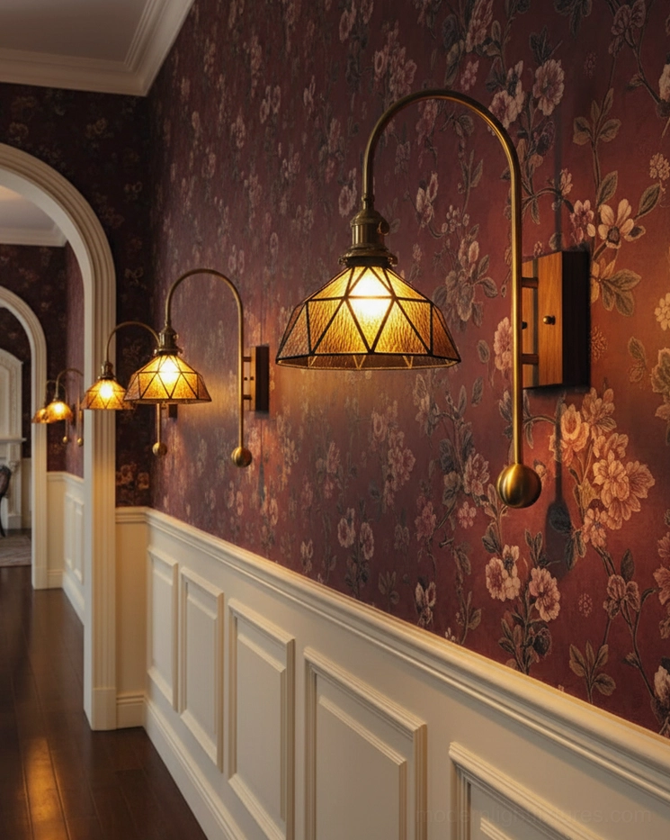Gallery-quality wall sconce with geometric glass shade and museum-quality brass finish