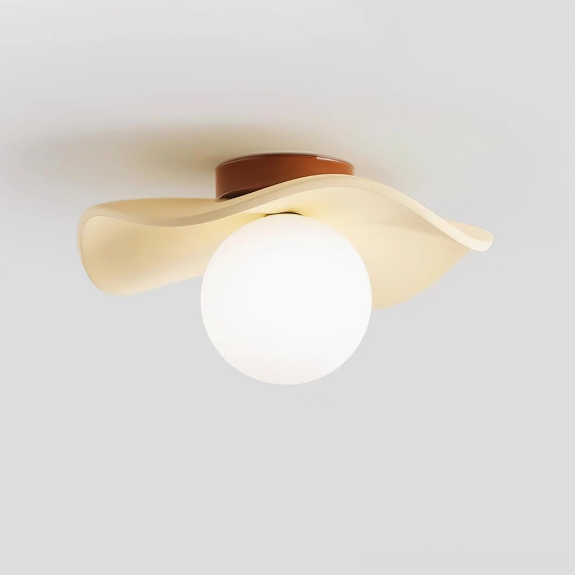 Gand globe flush mount ceiling light illuminated showing warm soft light diffusion