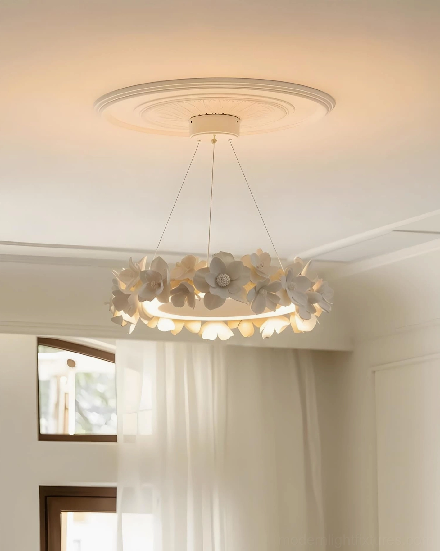 Gardenia Loop Chandelier glowing LED ring in bright formal living room with neutral warm color palette and eye-level perspective