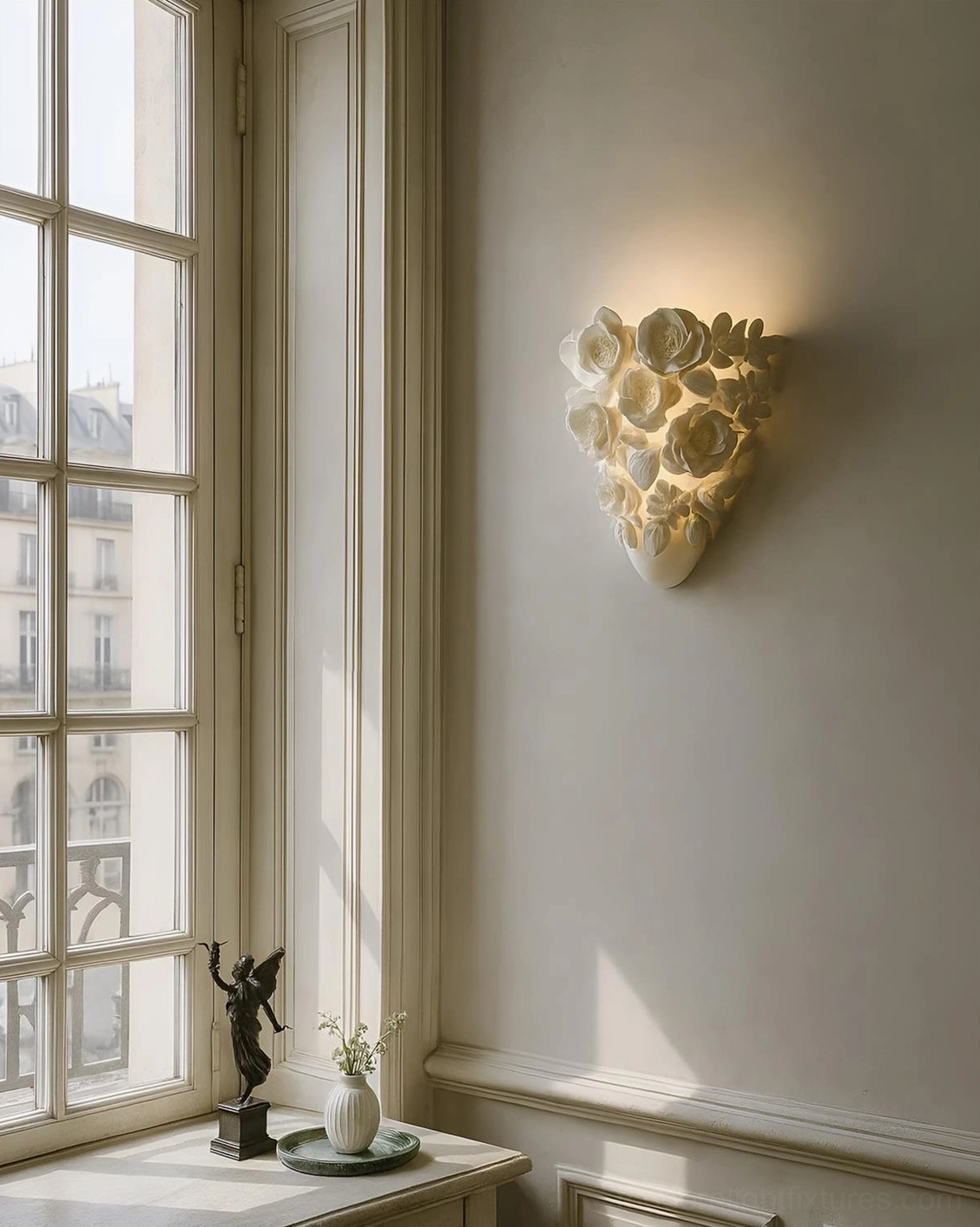 Gardenia floral wall sconce in Parisian apartment interior, warm light on paneled wall