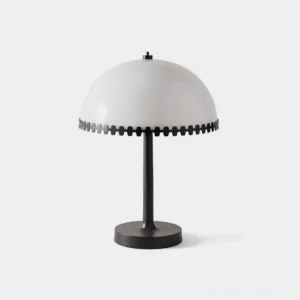 Gearline industrial table lamp with scalloped gear-trim dome shade, matte black metal base, front view on white background