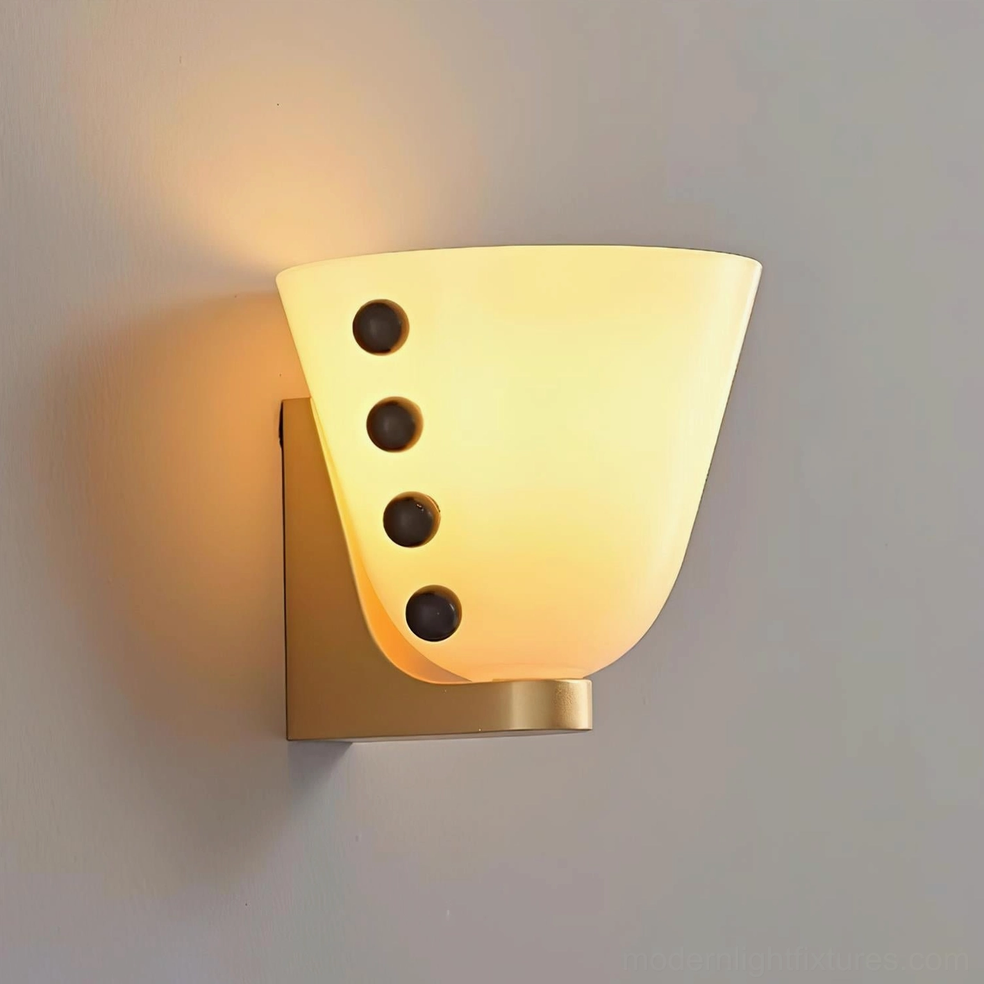 Gemma modern wall sconce creating ambient lighting in eclectic bedroom accent wall display
