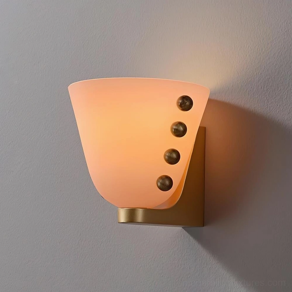 Gemma frosted glass wall sconce illuminated with warm light, three-quarter view on gray wall