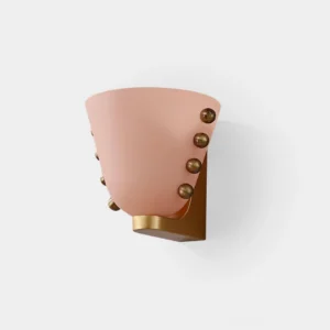 Gemma modern wall sconce with pink frosted glass shade and brass spherical studs, front view on white background