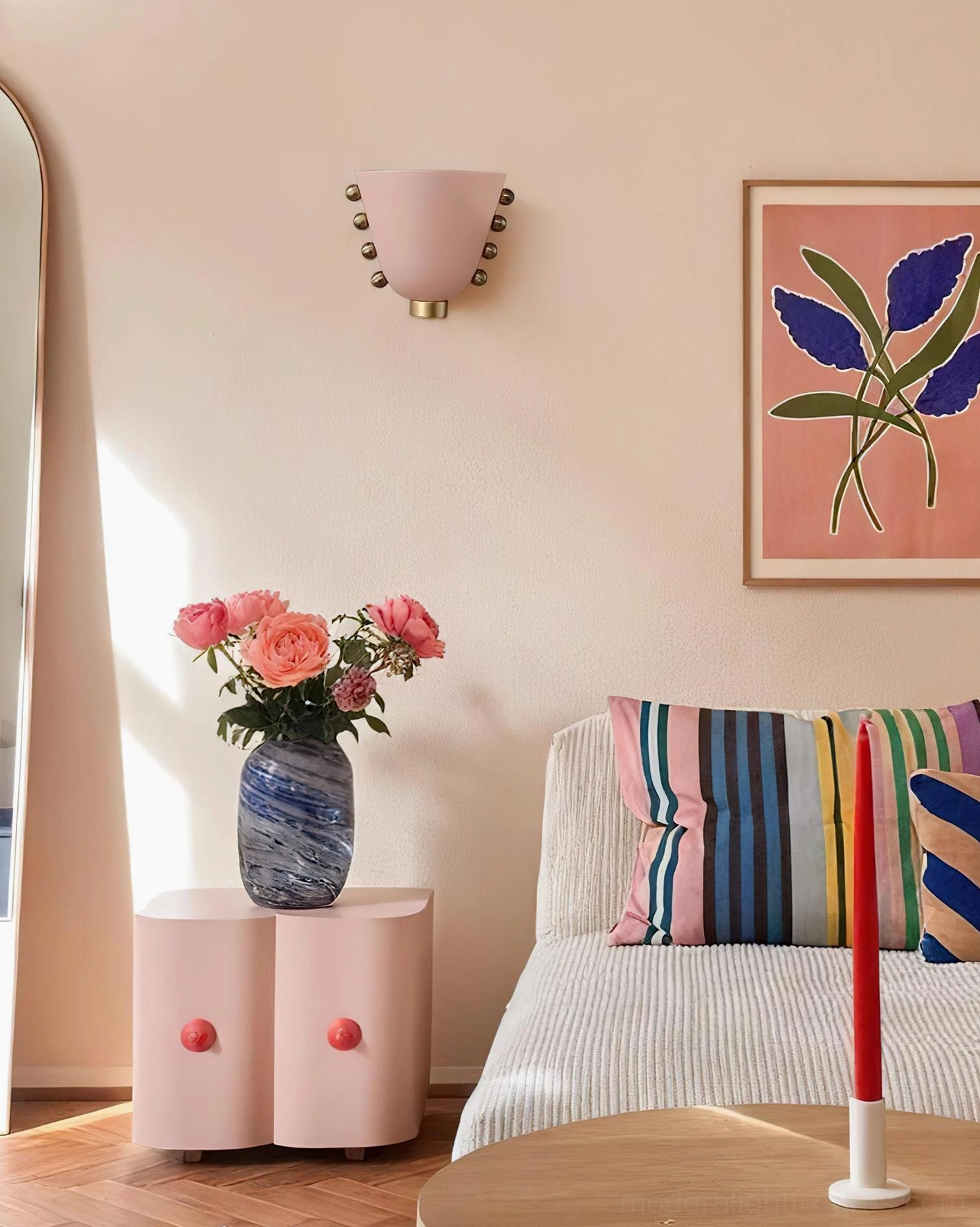 Gemma pink wall sconce mounted in Nordic-style living room, distant side view in cozy residential setting