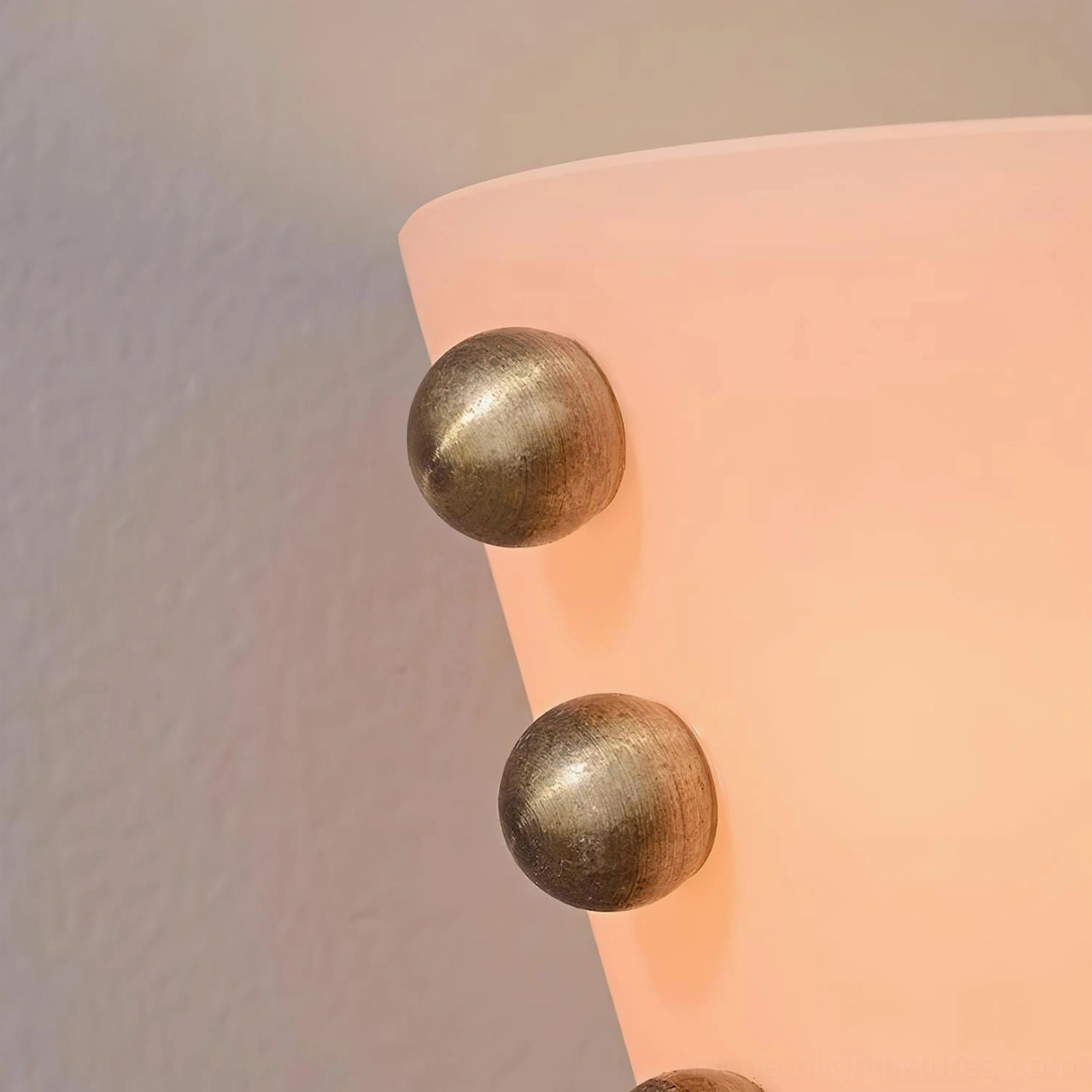 Gemma modern wall sconce showing sculptural silhouette and gemstone-inspired glass construction