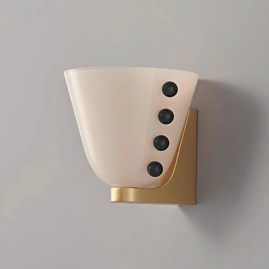 Gemma wall sconce in white frosted glass with matte gold base and spherical brass studs