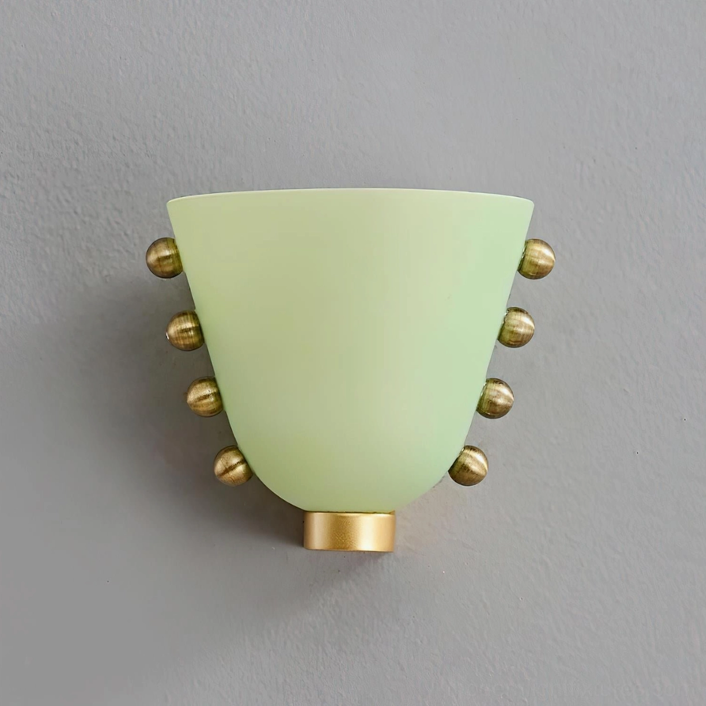 Gemma white wall sconce with geometric glass design mounted in modern minimalist bathroom