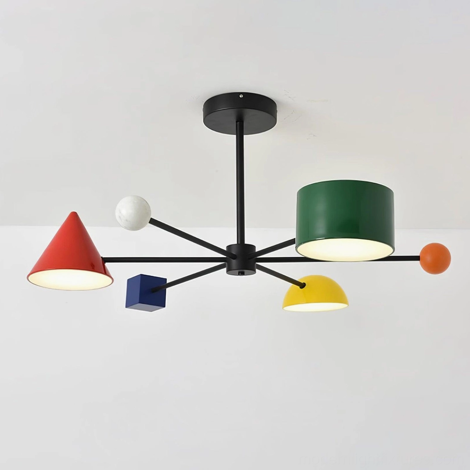 Modern geometric colorful ceiling fixture with black frame and vibrant acrylic lamp heads in interior design