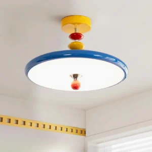 Modern playful ceiling light fixture installed in bedroom corner with yellow wall accents and geometric color coordination