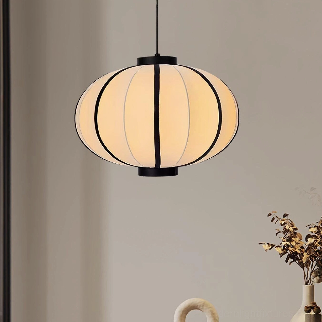 Contemporary fabric lantern pendant lamp, three-quarter side angle minimalist design