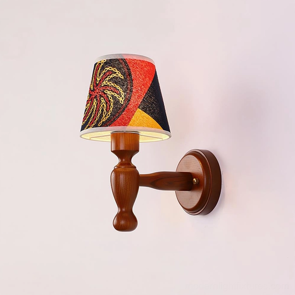 Modern wood wall lamp with geometric spiral printed shade, contemporary design