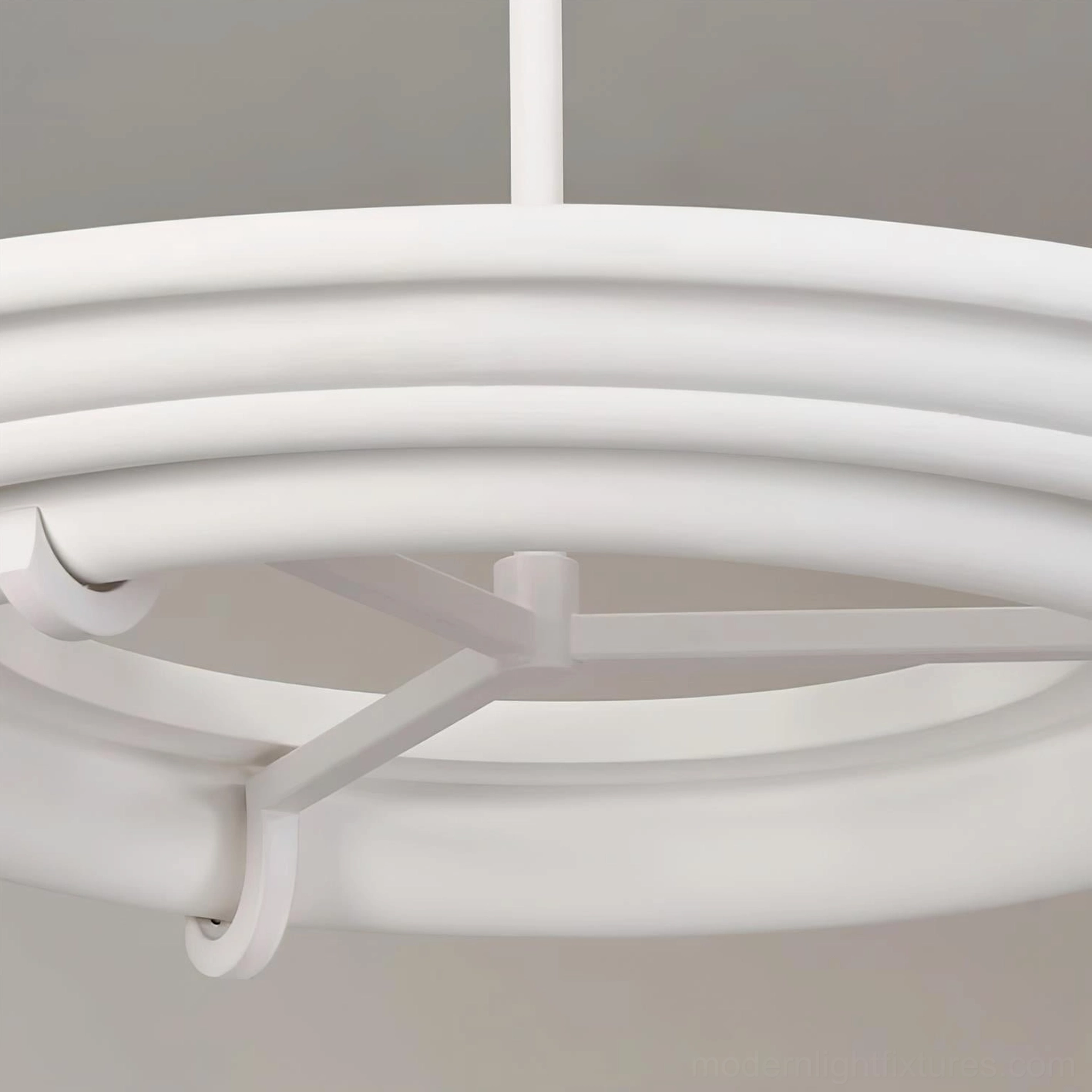 White ring pendant fixture architectural design with geometric circular layers
