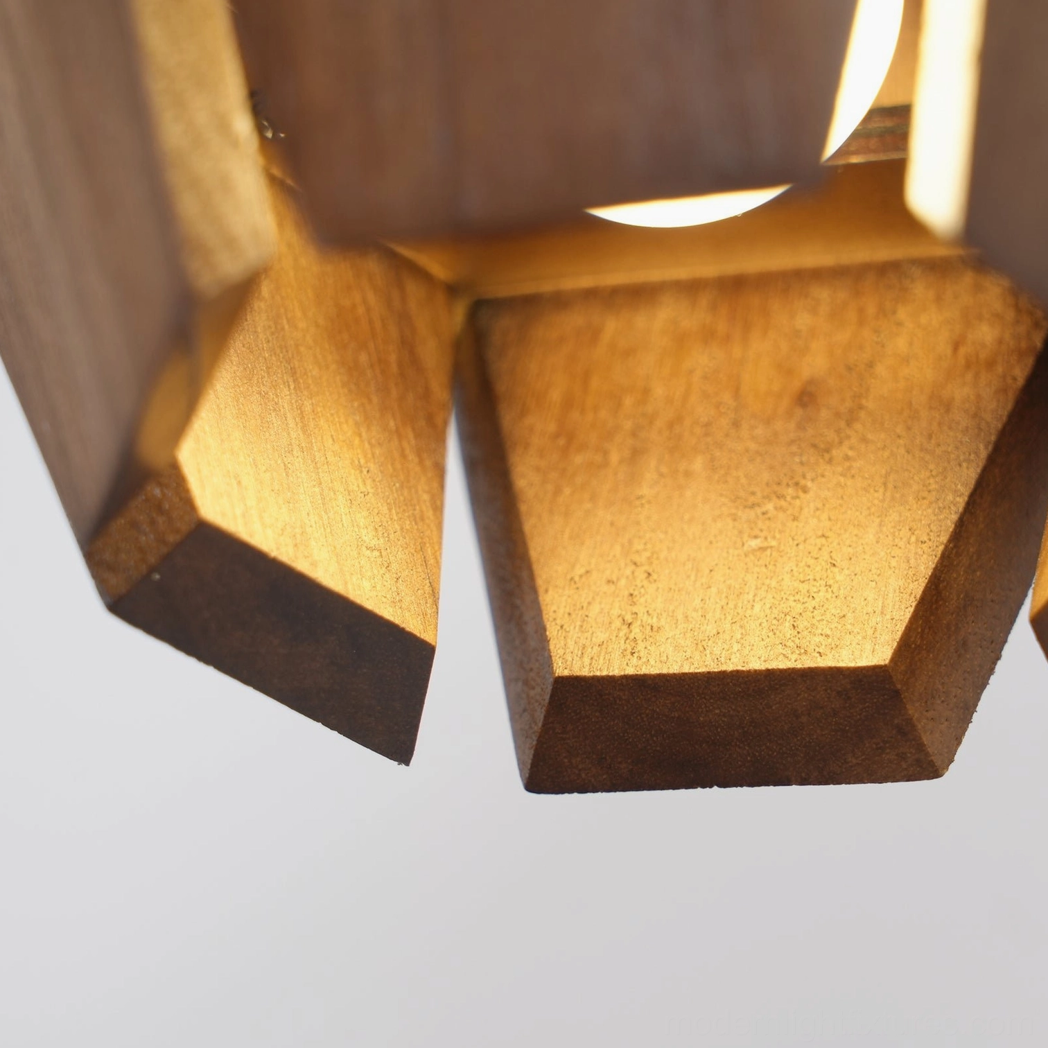 Geometric wood wall sconce pair installation symmetrical modern interior design styling
