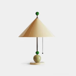 Georia geometric table lamp front view with cream conical shade and green decorative spheres on white background