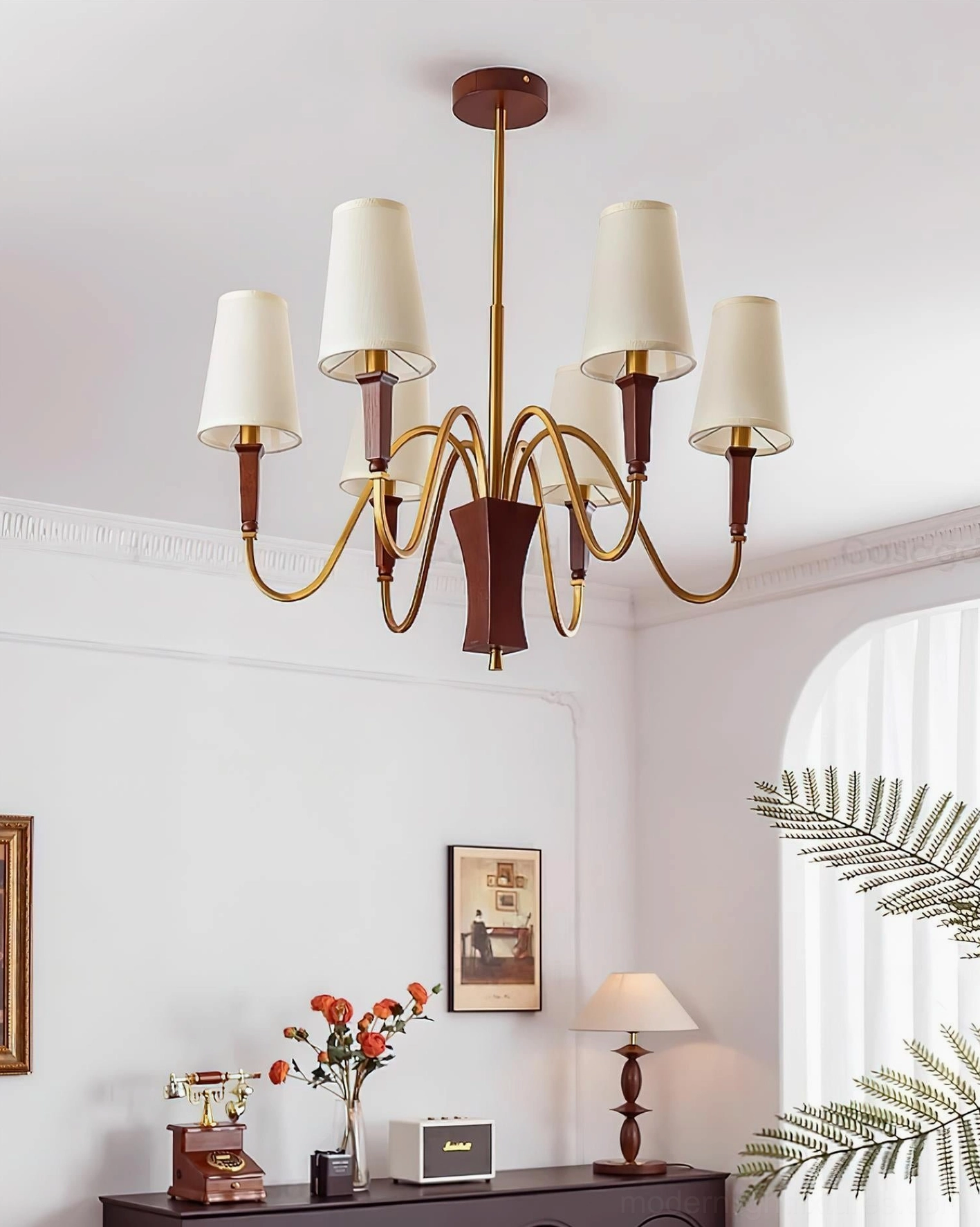 Close-up detail of Gianna chandelier tapered fabric shade and metal arm connection showing craftsmanship