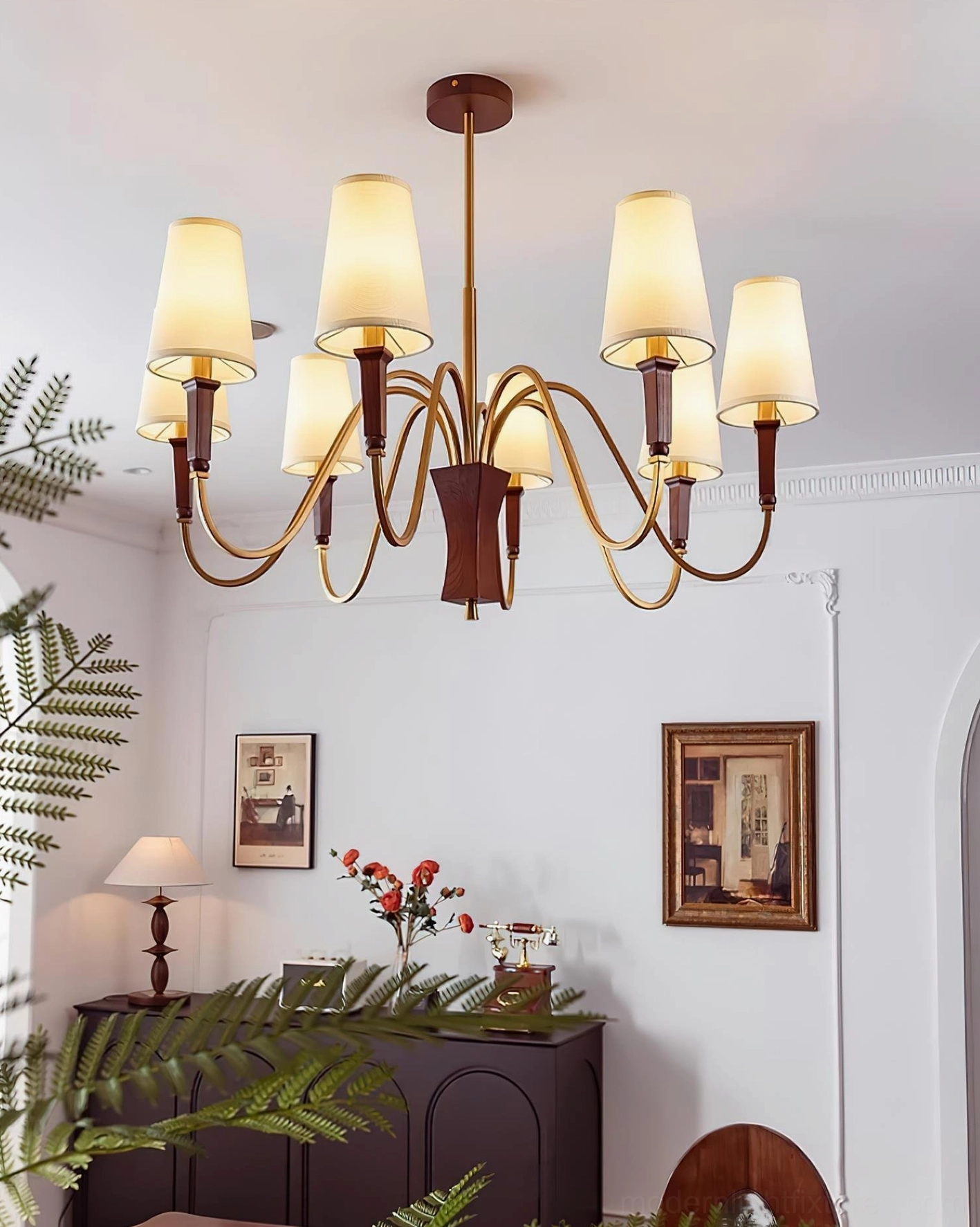 Gianna multi-head chandelier full room view in elegant interior setting with warm ambient lighting effect