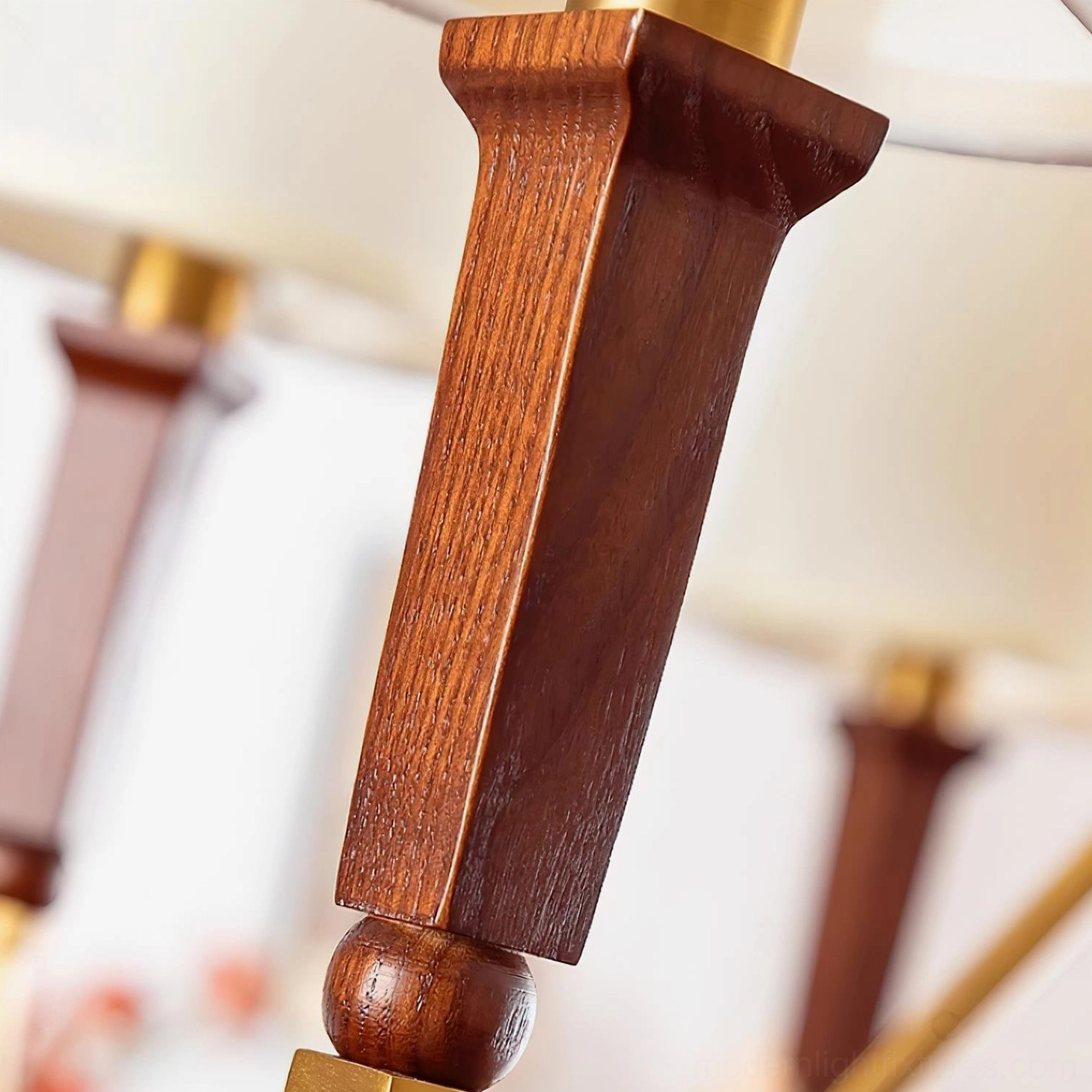 Gianna multi-head chandelier interior lifestyle shot showing sculptural organic arm design and ambient warmth
