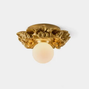 Gildara ornate floral flush mount ceiling light in gilded gold finish, direct front studio view showing carved botanical details and frosted glass bulb