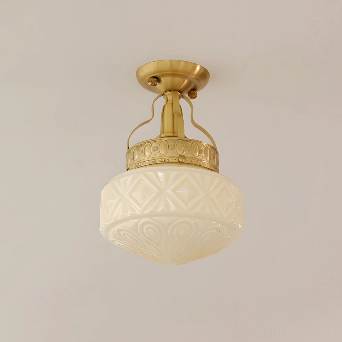 Gilded Prism ceiling light fixture with Brass & Beige color option, showing carved glass shade detail and warm finish