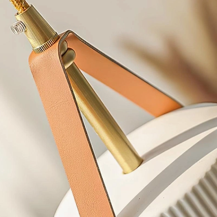 Mid-century modern inspired ceramic ridged pendant with warm brass and genuine leather suspension elements
