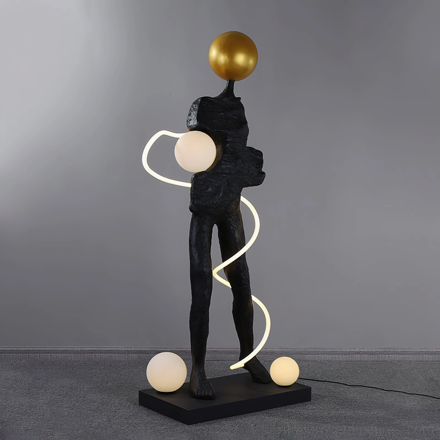 Ginasta artistic floor lamp humanoid sculpture form right front angle with frosted glass light spheres and spiral LED