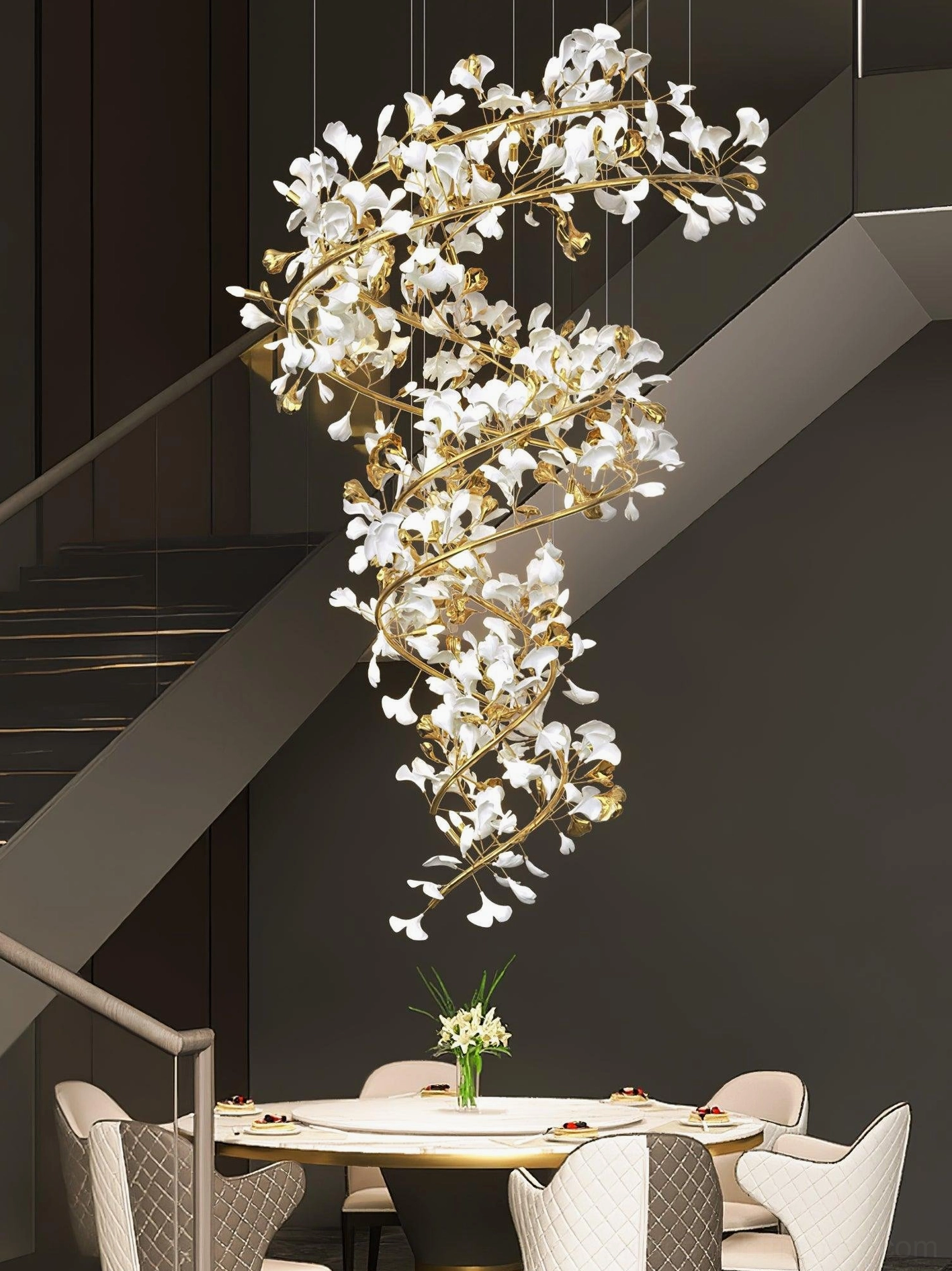Modern ginkgo leaf chandelier with adjustable metal branches fanned out to full diameter in contemporary interior lighting space