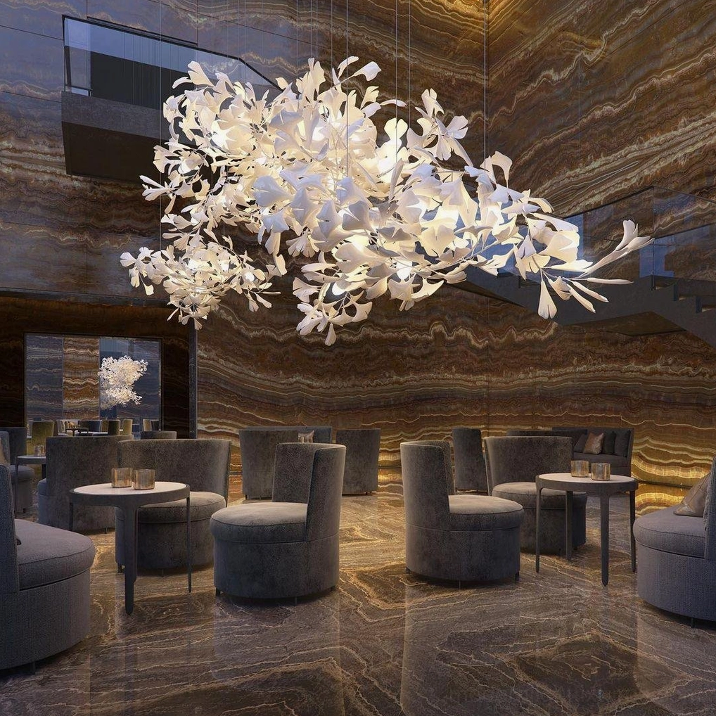 Ginkgo leaf chandelier with adjustable hanging cable and customizable branch positioning for bespoke installation