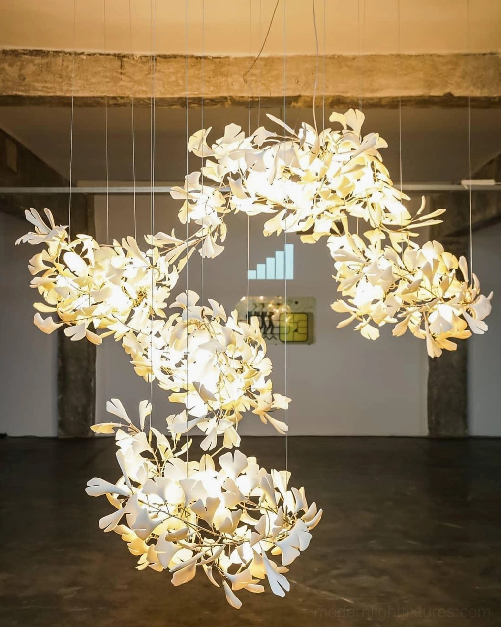 Ginkgo pendant chandelier showing artistic leaf arrangement and sculptural balance