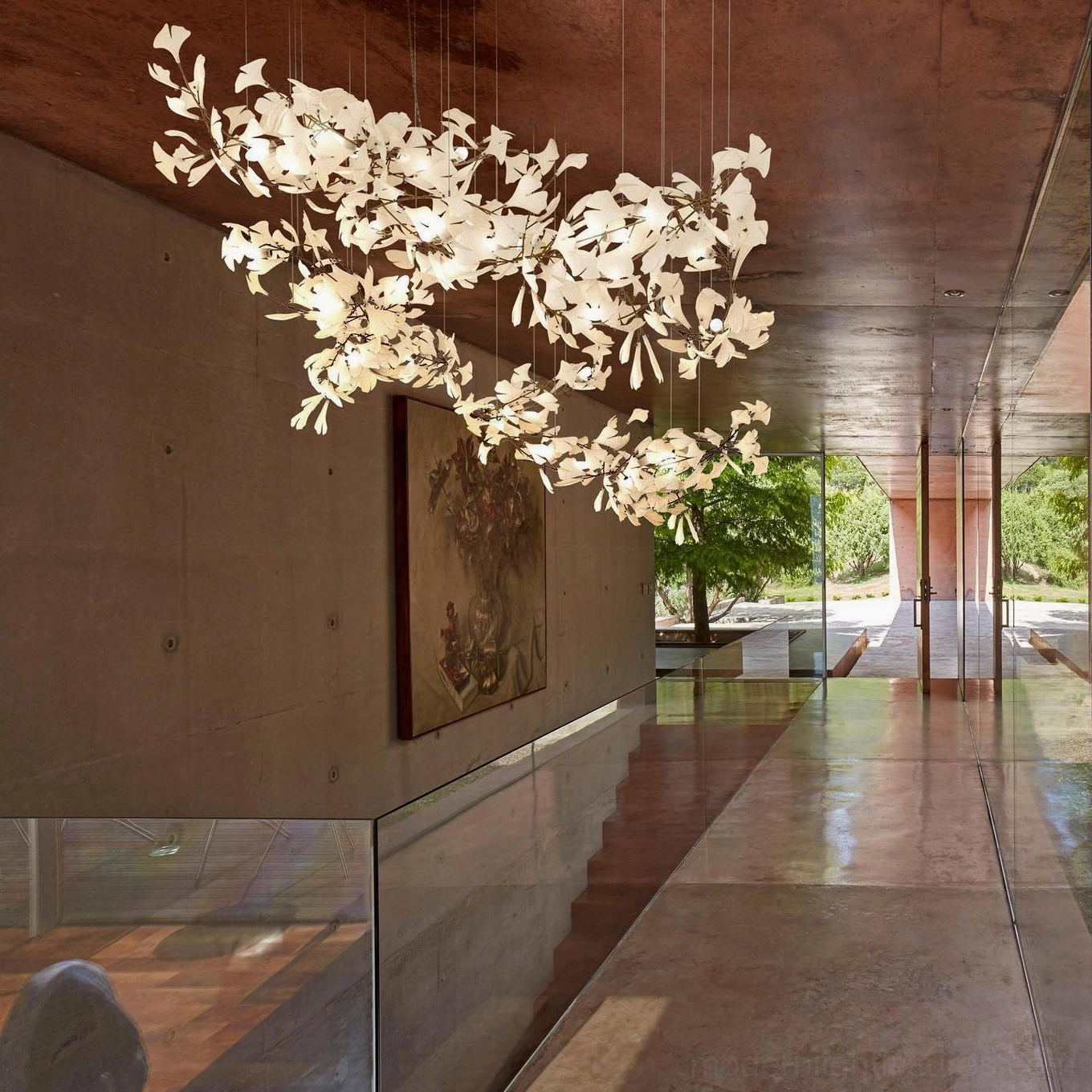 Contemporary artistic ginkgo leaf chandelier serving as statement lighting fixture and sculptural art piece