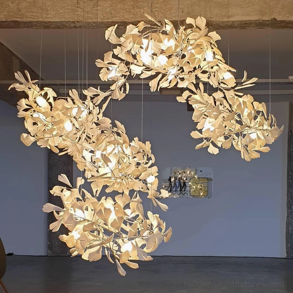 Ginkgo pendant chandelier assembly showing ceramic leaf arrangement before installation