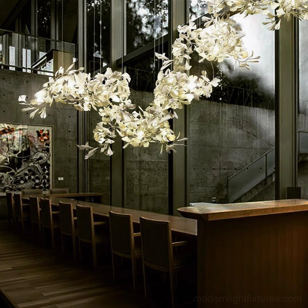 Ginkgo leaf chandelier creating visual interest with asymmetrical leaf arrangement and biomorphic design