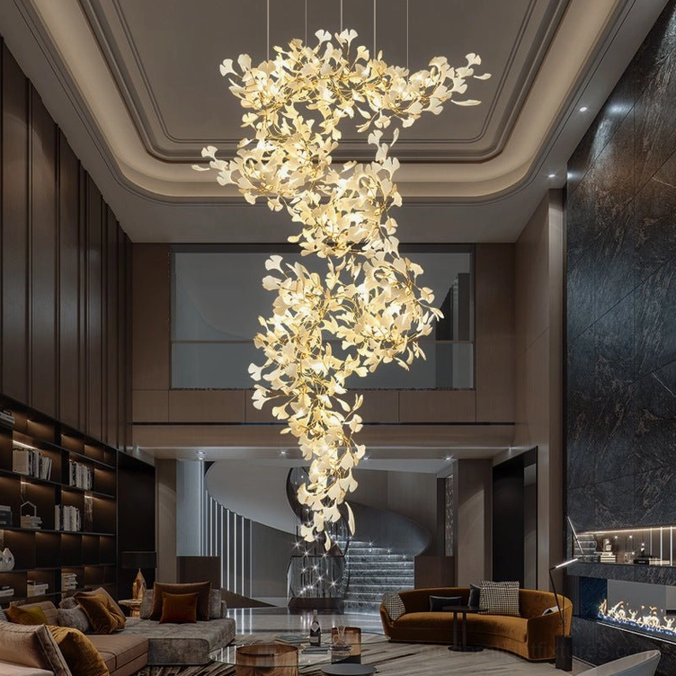 Ginkgo leaf pendant chandelier showing artistic ceramic form and metal support system