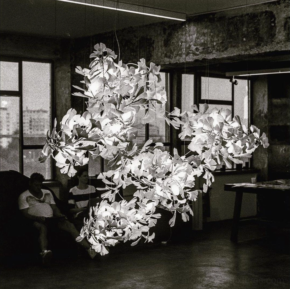 Modern ginkgo leaf pendant chandelier showing individual ceramic leaf craftsmanship and finish