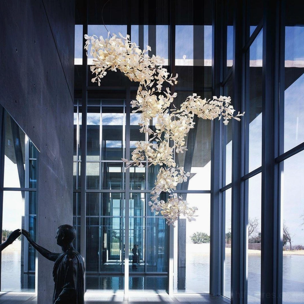 Ginkgo leaf pendant chandelier architectural detail showing ceramic leaf texture and metal branch construction