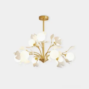 Ginkgo ceramic chandelier with hand-formed leaves, overhead studio view showing brass frame and frosted glass shades