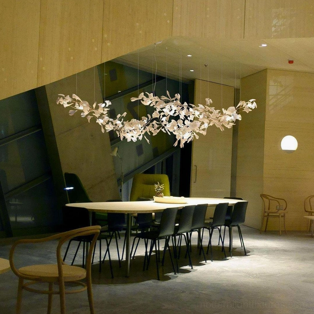 Modern sculptural ginkgo leaf chandelier with ceramic shade finish and dimmer switch compatibility