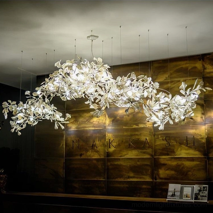 Ginkgo leaf pendant chandelier in luxury commercial space demonstrating sophisticated design aesthetic