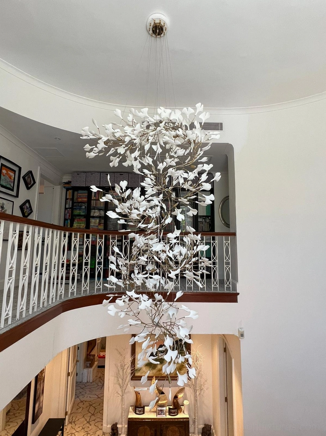 Ginkgo leaf pendant chandelier installation overview showing complete fixture assembly