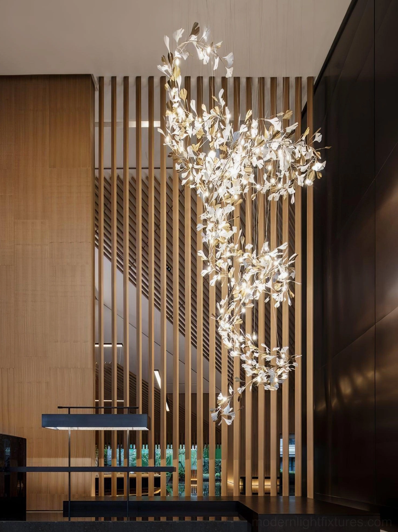 Modern ginkgo leaf pendant chandelier showing complete leaf spread in neutral lighting