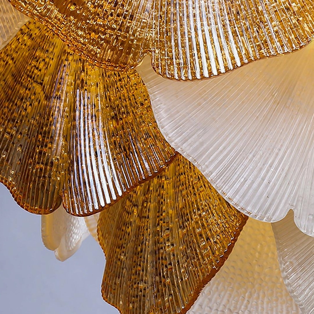 Ginkgo chandelier three-quarter corner view showcasing compact luxury design and polished gold finish