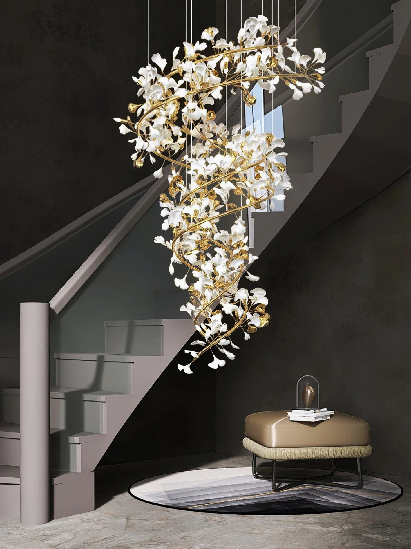 Ginkgo leaf chandelier with gold metal structure and crystal leaves above grey metal staircase in duplex modern home interior